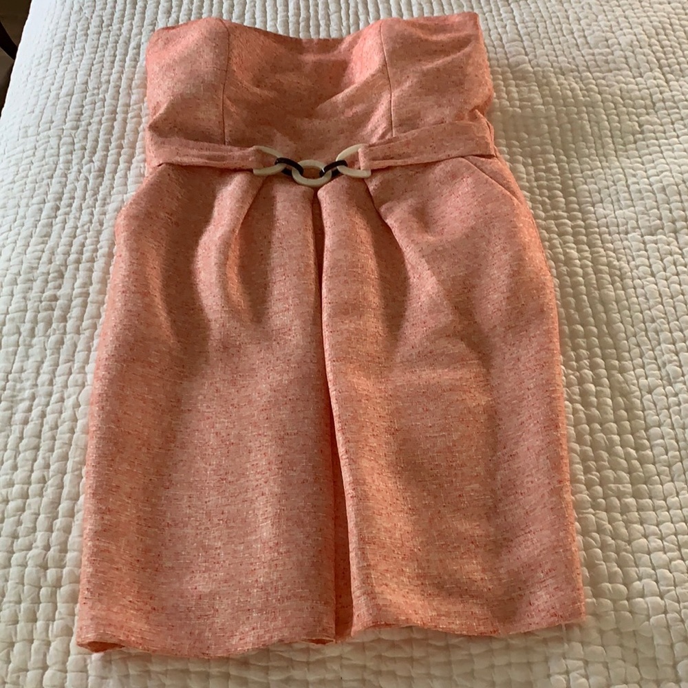 Red and cream strapless dress lined with pockets